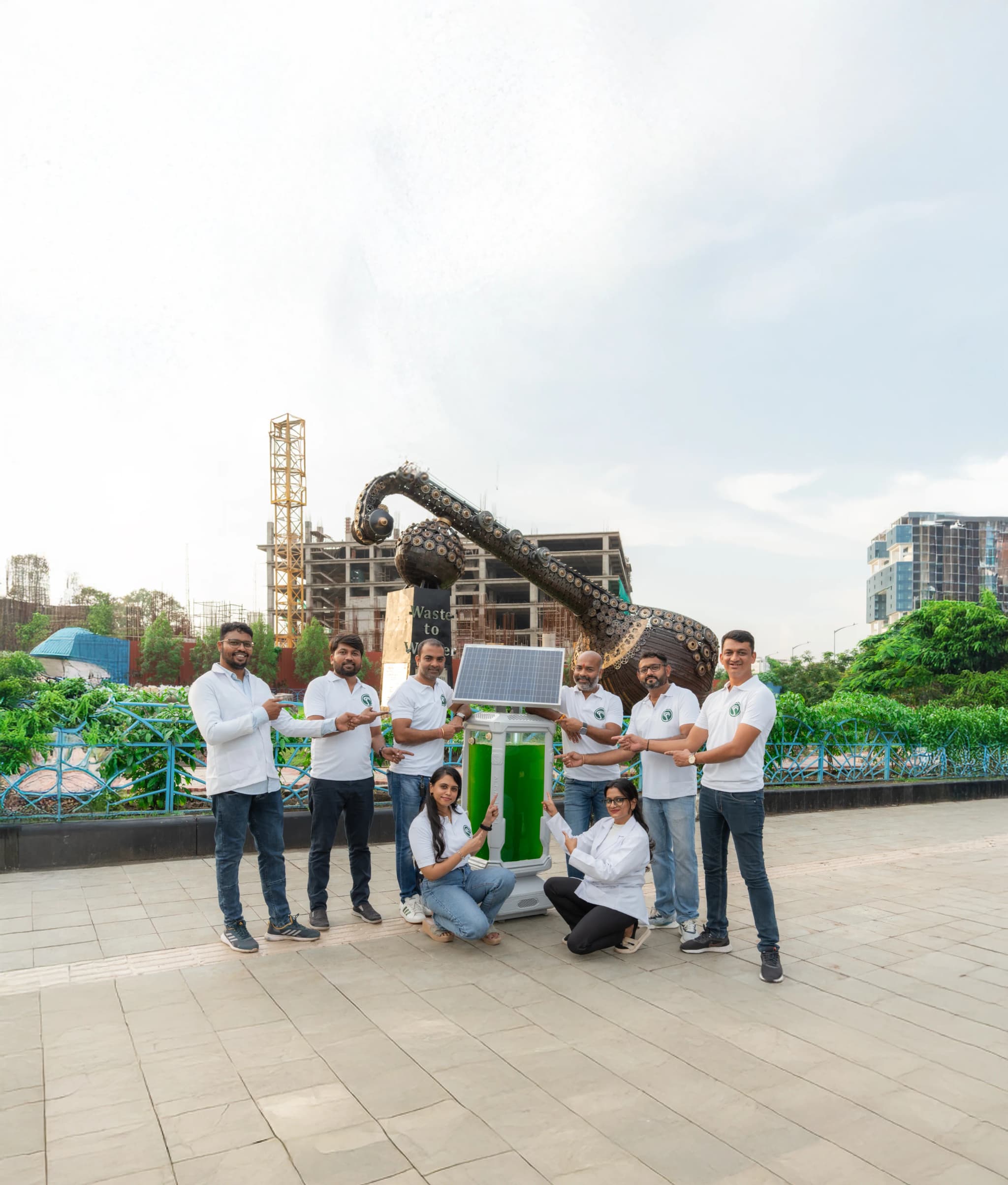 The AlgaeTree team standing with the product prototype outdoors